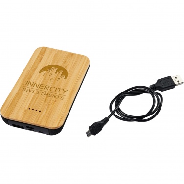 Logotrade reklaamkingi foto: Tulevane 6000 mAh bambusest/kangast juhtmevaba akupank