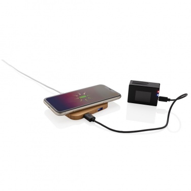 Logotrade meene foto: Bambusest 10 W juhtmevaba laadija USB-ga