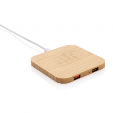 Logotrade meened pilt: Bambusest 10 W juhtmevaba laadija USB-ga