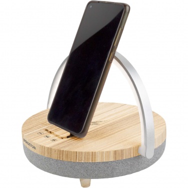 Логотрейд pекламные cувениры картинка: Prixton динамик Bluetooth® 4-в-1 мощностью 10 Вт со светодиодной подсветкой и базой для беспроводной зарядки
